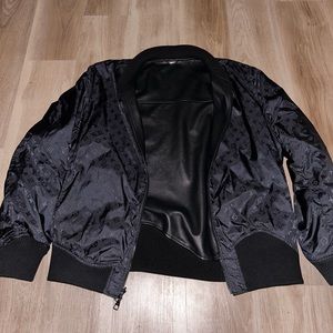Reversible monogram bomber jacket
